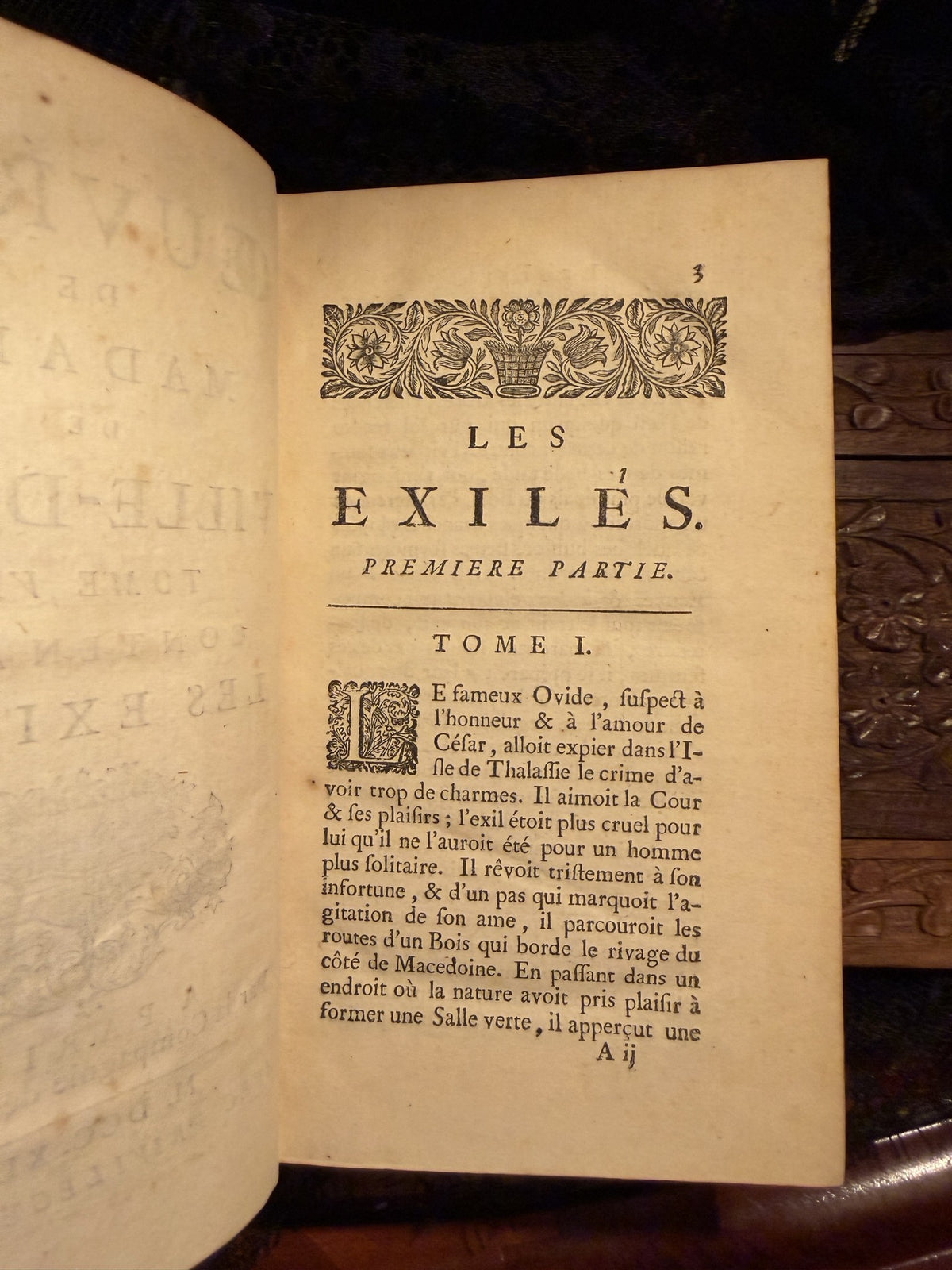Opening page of Les Exiles, Premiere Partie, with woodcut headpiece and drop capital, IM-0053