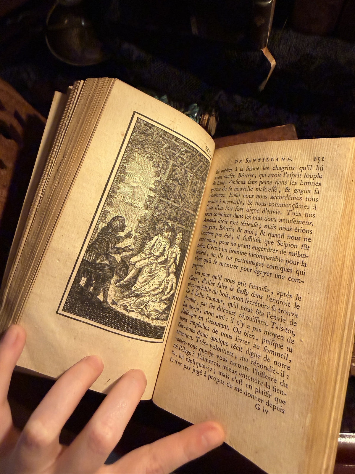 Engraved plate at page 151 showing figures gathered in a dim interior, Gil Blas, IM-0054
